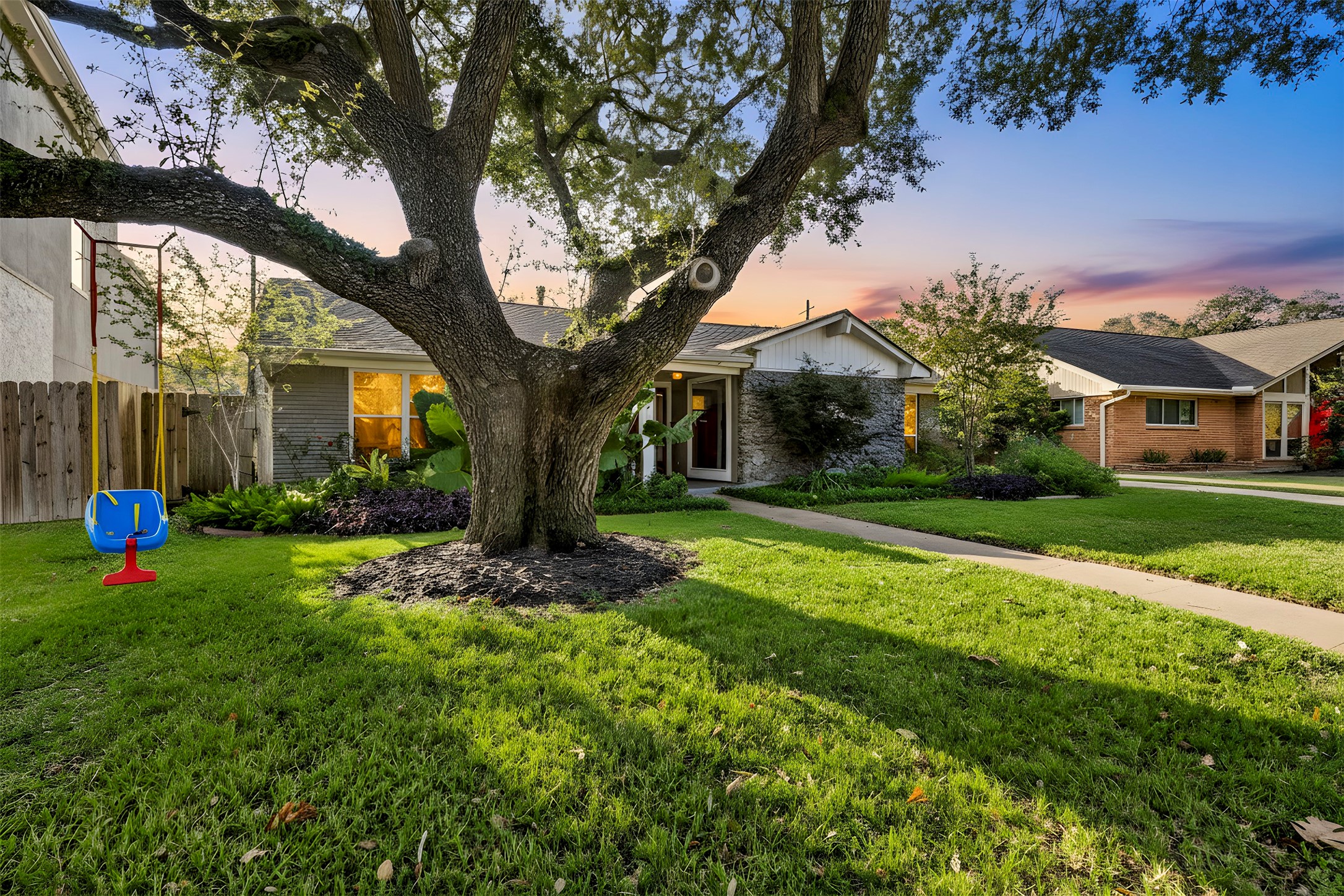 8422 Academy Street Houston, TX 77025 - Photo 42 of 47 a view of a house with a yard