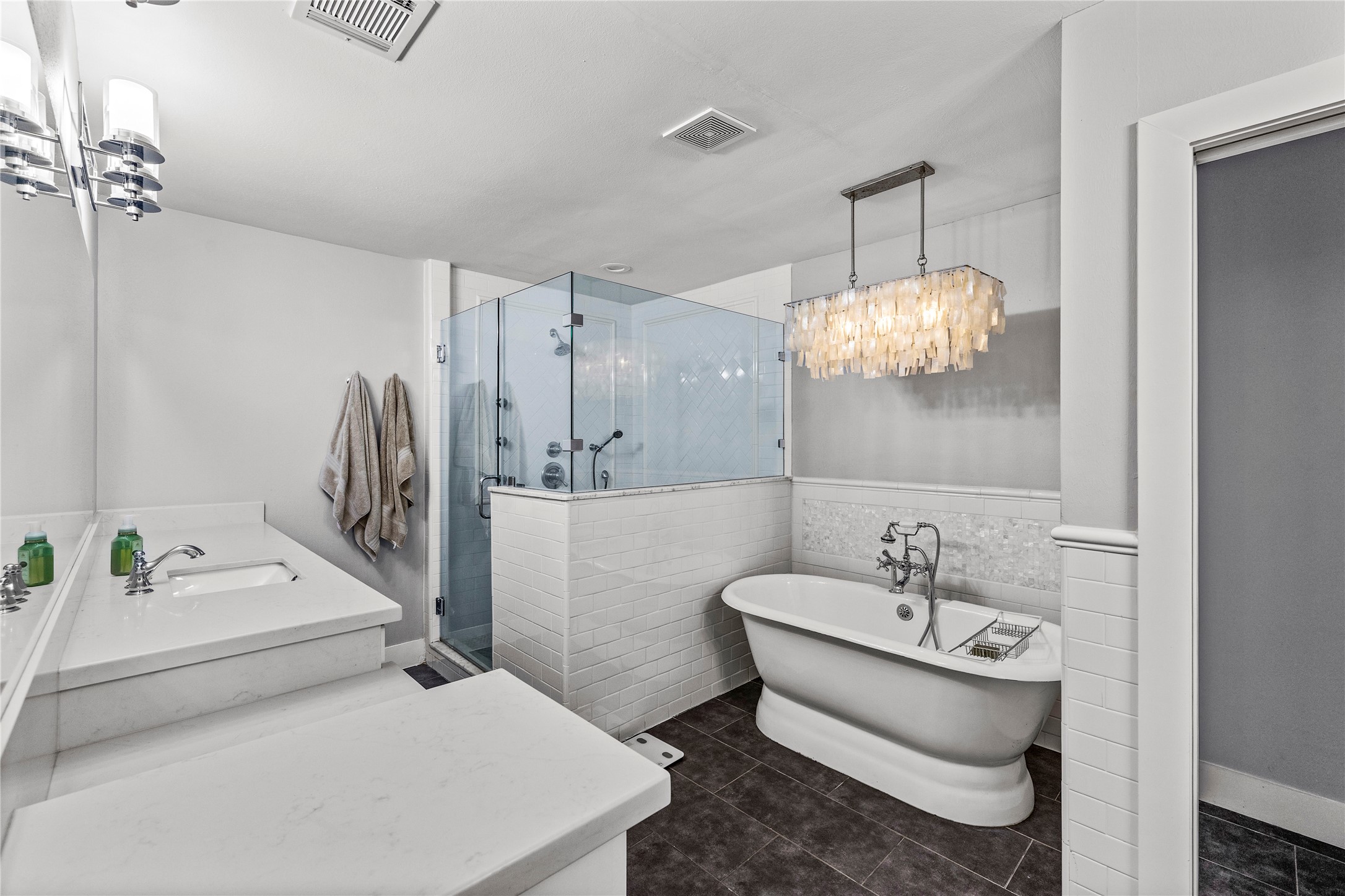 8422 Academy Street Houston, TX 77025 - Photo 9 of 47 a bathroom with a sink a toilet and shower curtain