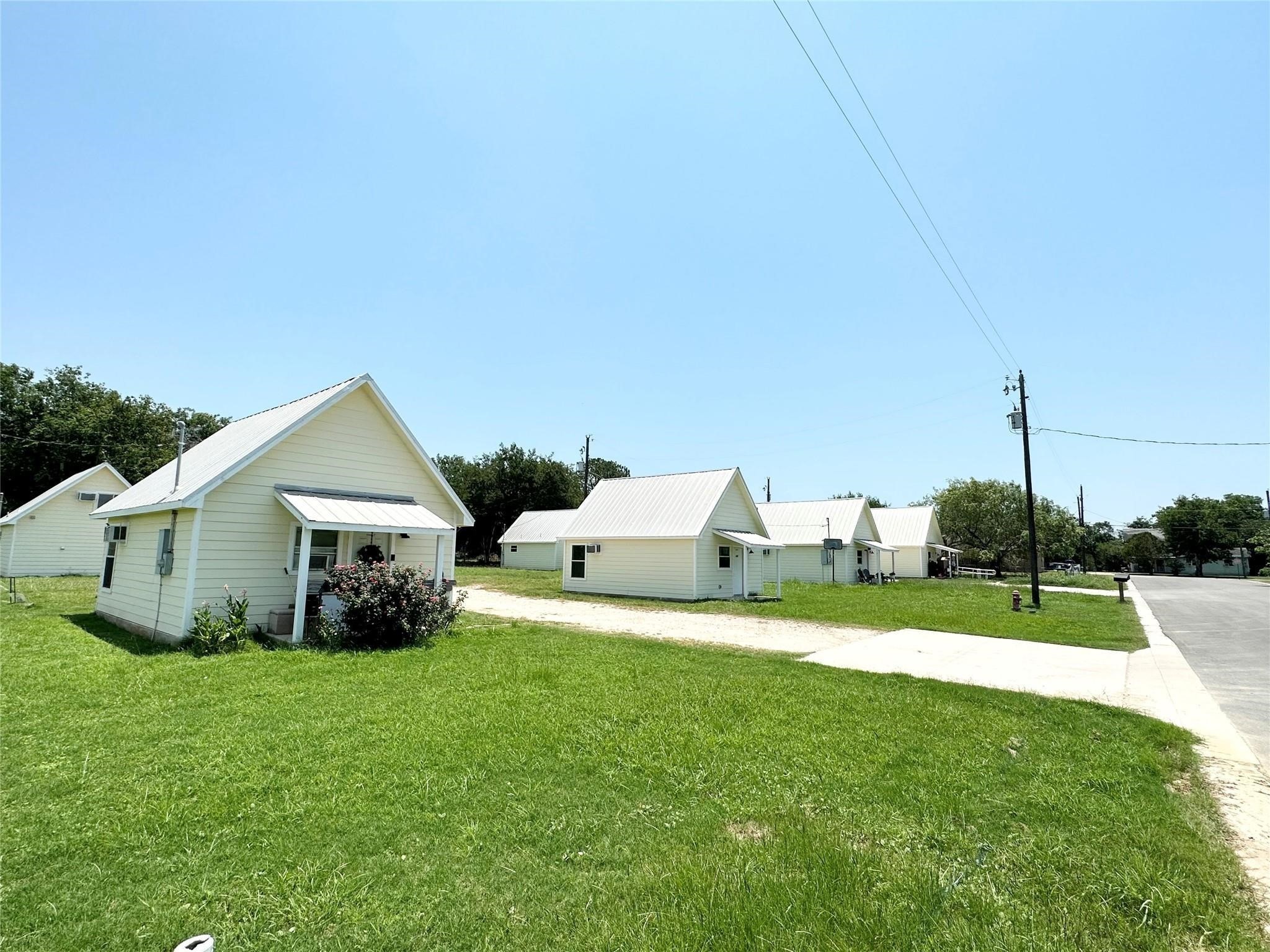 403 Free Timber Lane, Unit 3 Stockdale, TX 78160 - Photo 5 of 6 a view of a house with backyard and porch