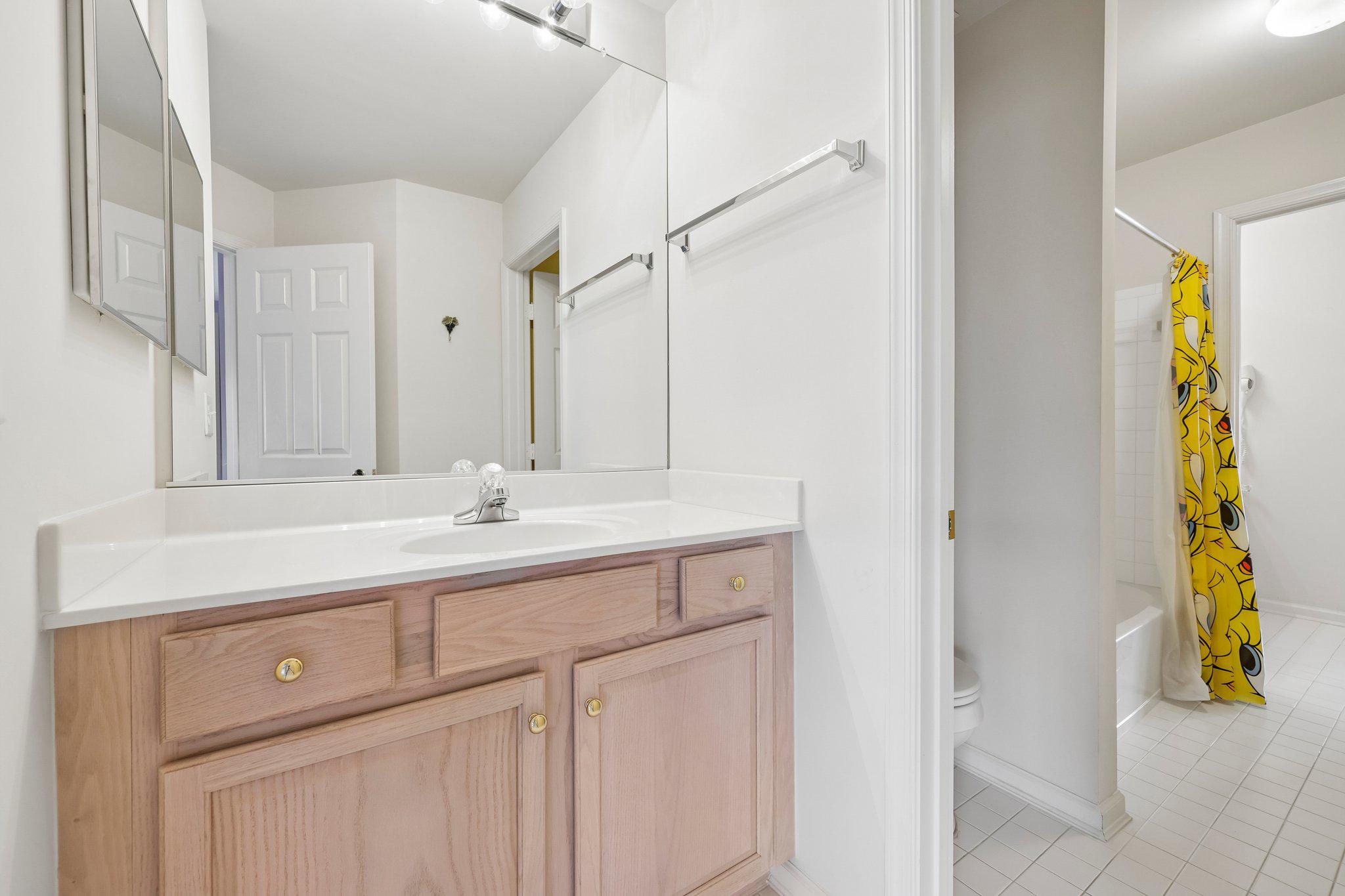 331 Alfandre Street Gaithersburg, MD 20878 - Photo 26 of 38 Bright jack-and-jill attic bathroom.