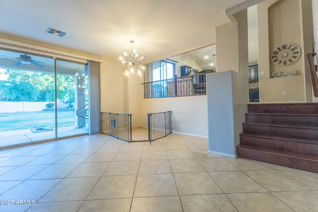 a view of entryway and hall with a window
