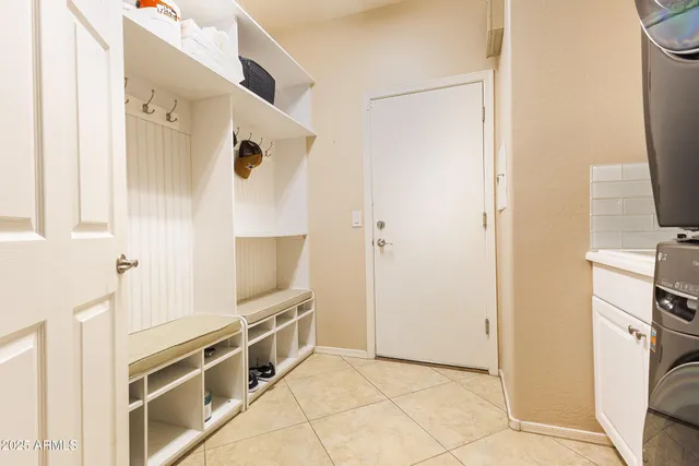 a kitchen with stainless steel appliances a refrigerator and a stove