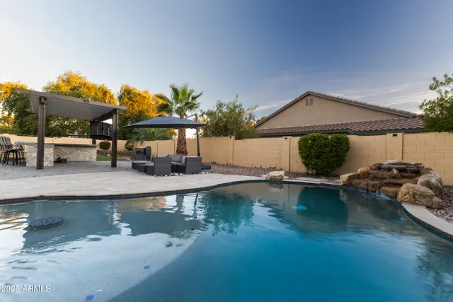 swimming pool with outdoor seating