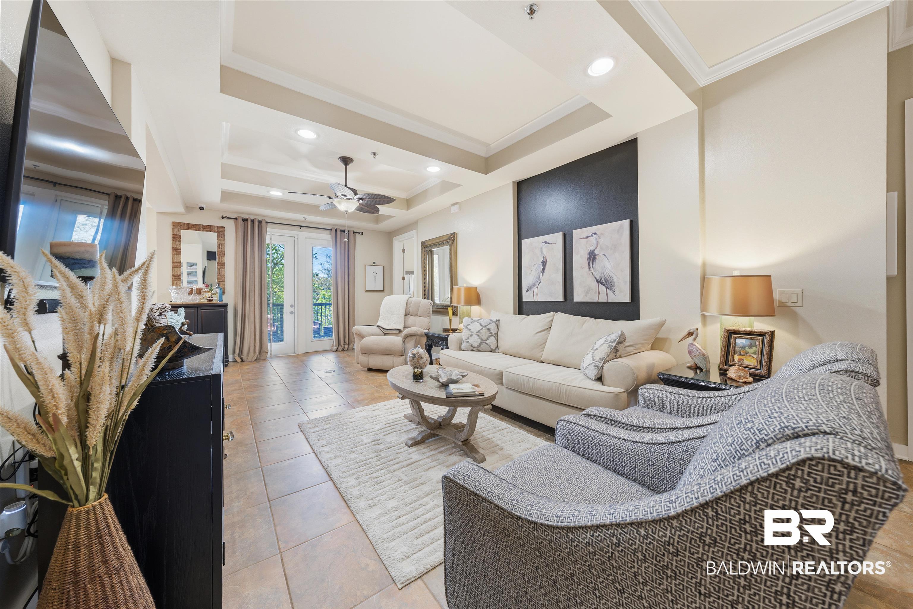 1430 Regency Road, Unit H202 Gulf Shores, AL 36542 - Photo 20 of 25 Living room featuring crown molding, french doors, recessed lighting, ceiling fan, and light tile patterned floors
