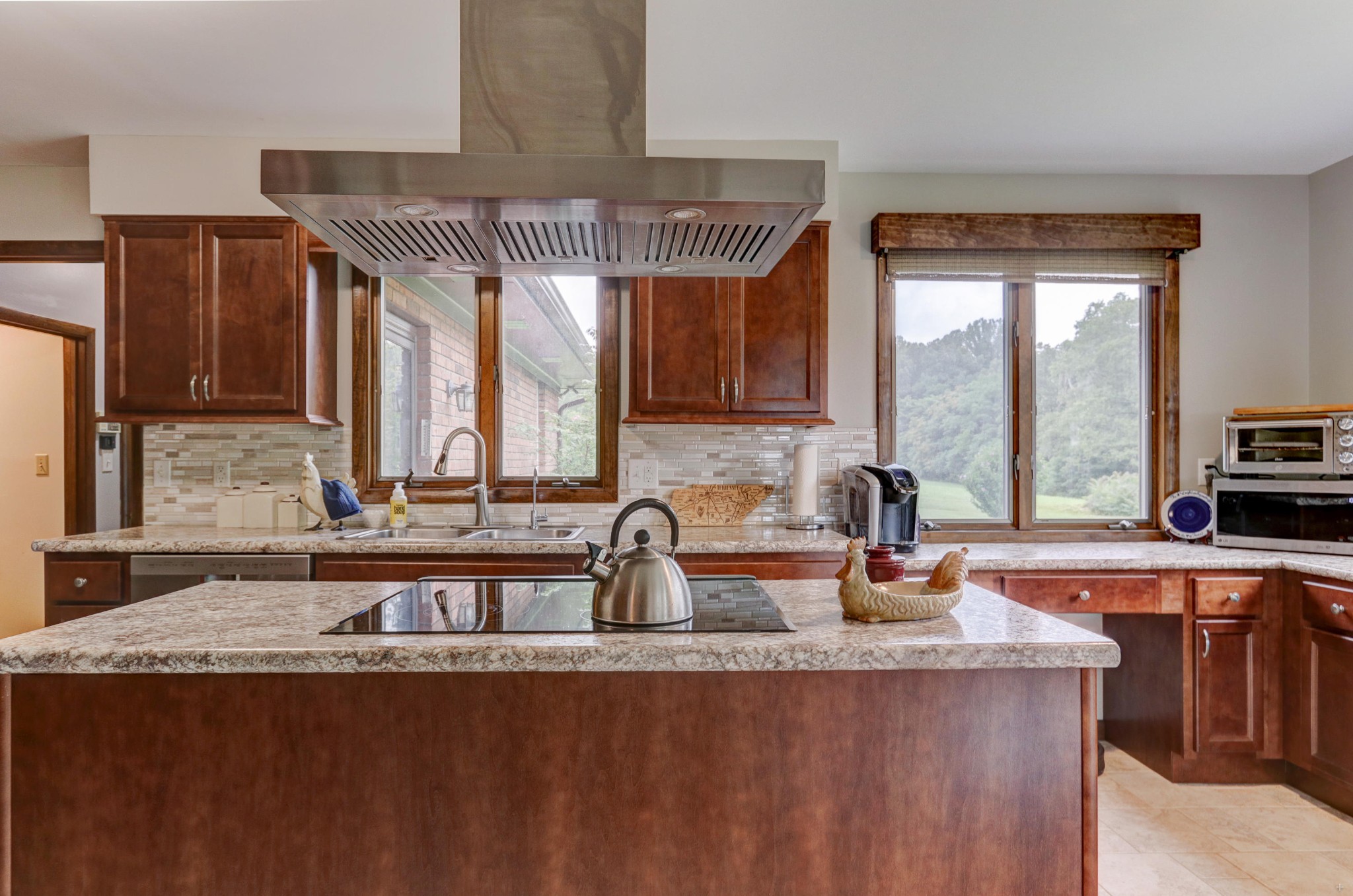 8520 Majors Road Corryton, TN 37721 - Photo 8 of 28 a kitchen with stainless steel appliances granite countertop a sink a stove and a wooden cabinets