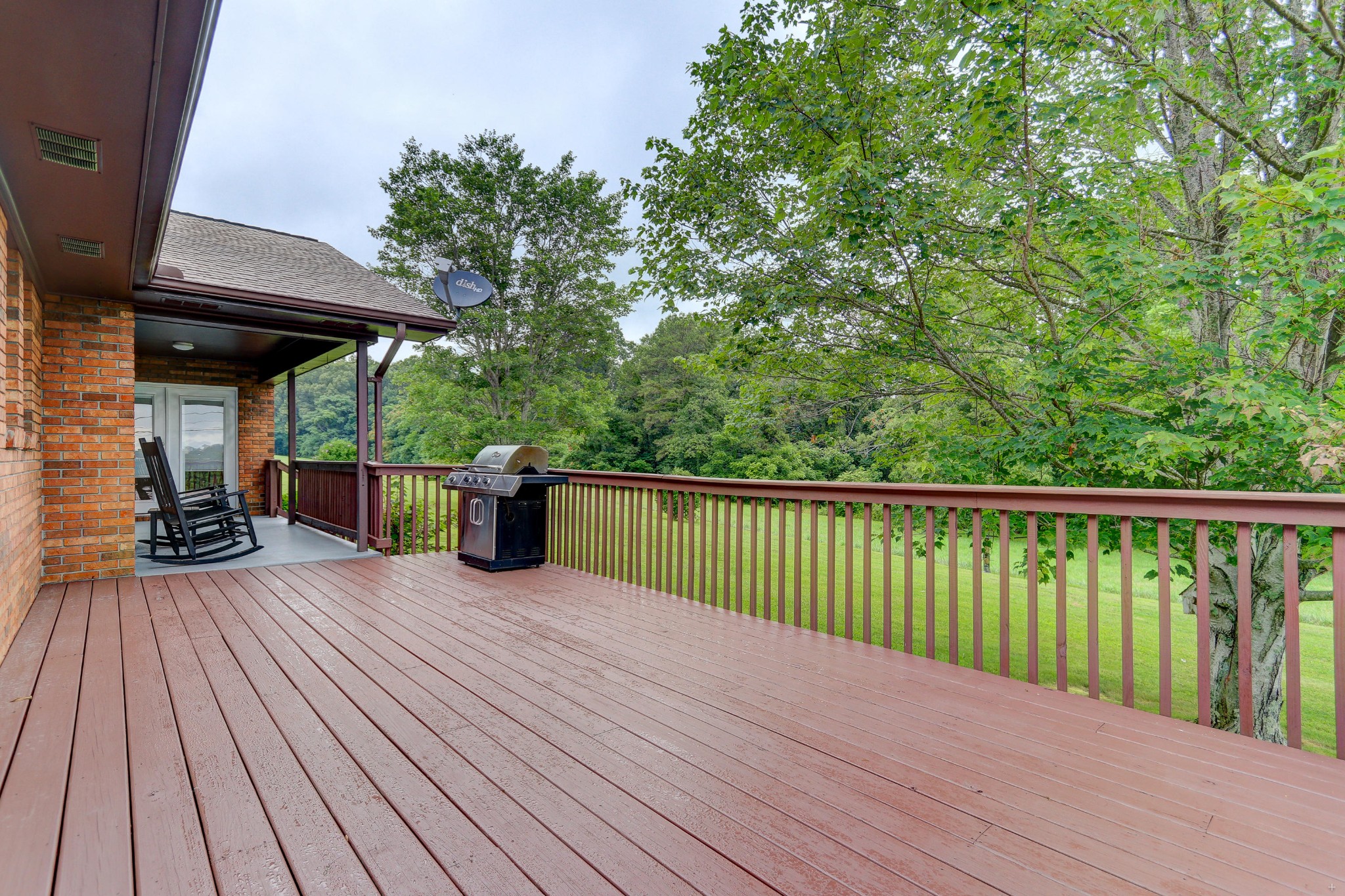 8520 Majors Road Corryton, TN 37721 - Photo 10 of 28 a view of a balcony with furniture and wooden floor