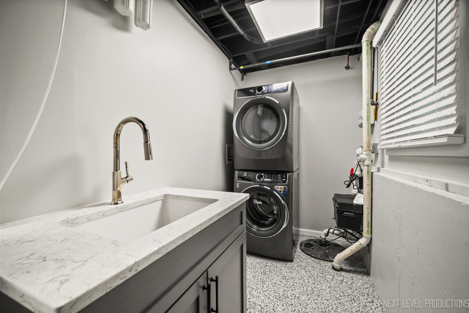 1718 Jeanette Avenue St. Charles, IL 60174 - Photo 31 of 36 a close view of a sink and washer and dryer