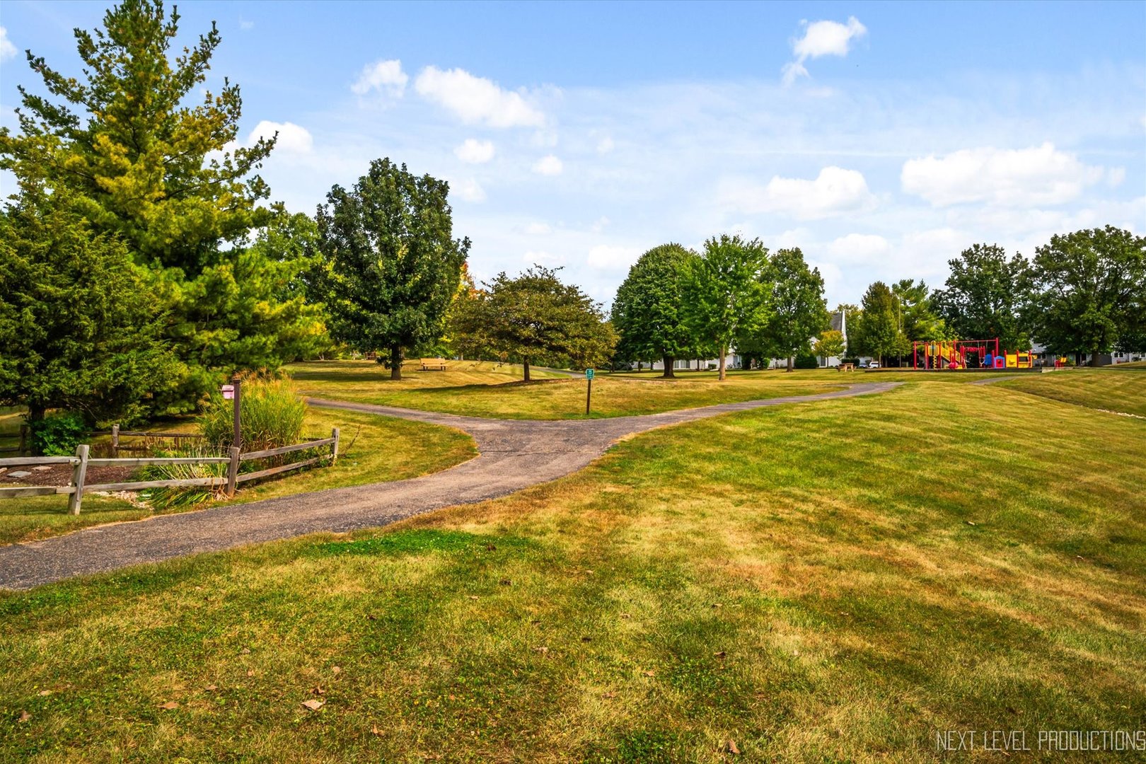 1718 Jeanette Avenue St. Charles, IL 60174 - Photo 4 of 36 a view of an swimming pool with an outdoor space and seating area
