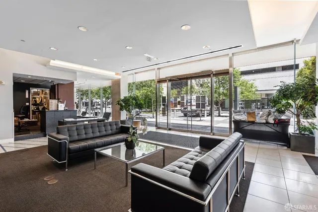 a view of a car park in front of a building