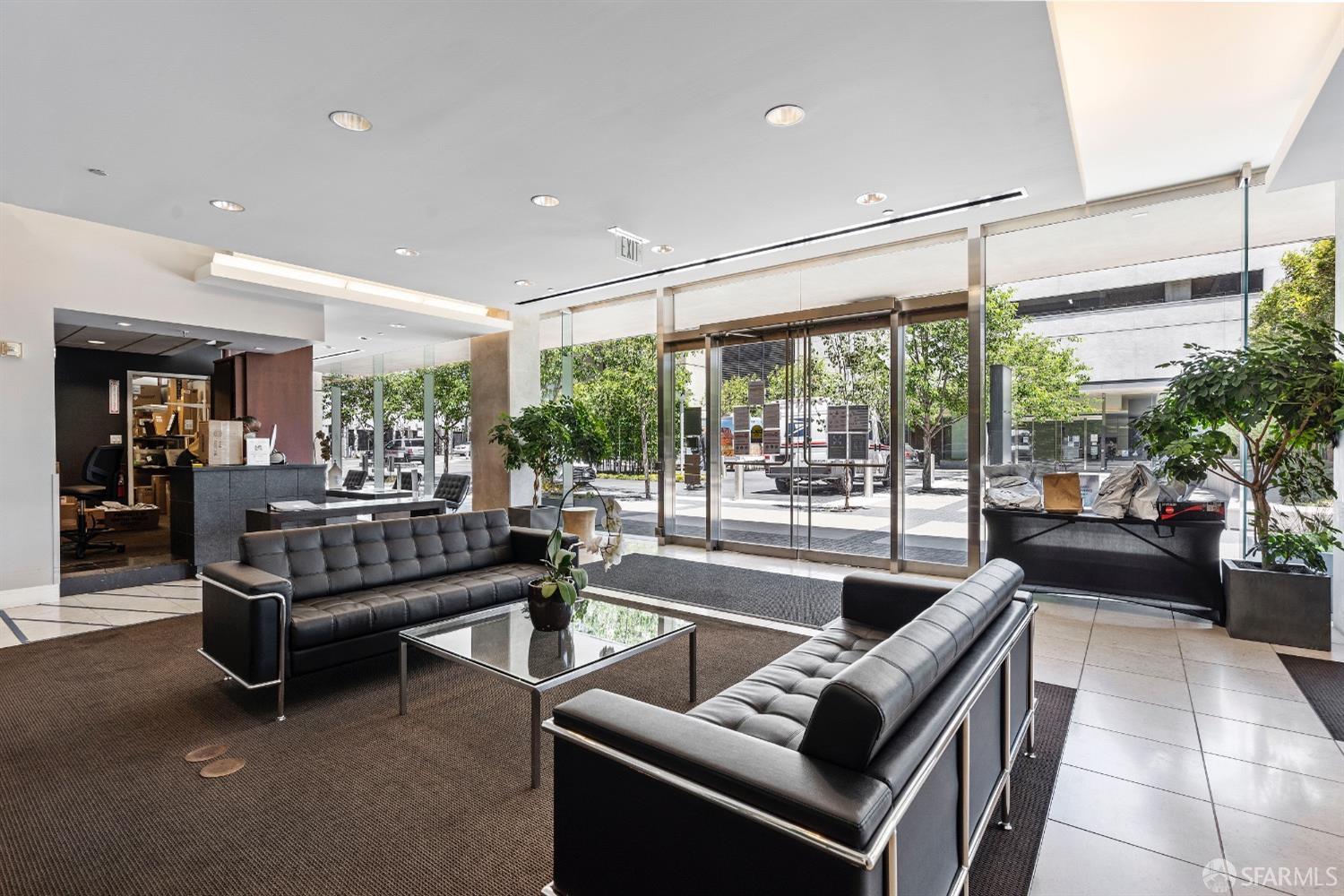 260 King Street, Unit 1107 San Francisco, CA 94107 - Photo 21 of 58 a living room with furniture and a large window