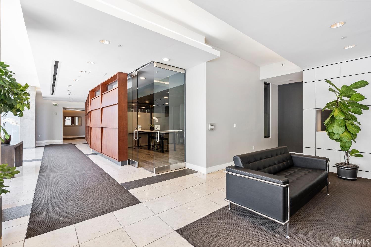 260 King Street, Unit 1107 San Francisco, CA 94107 - Photo 22 of 58 a living room with furniture and a potted plant