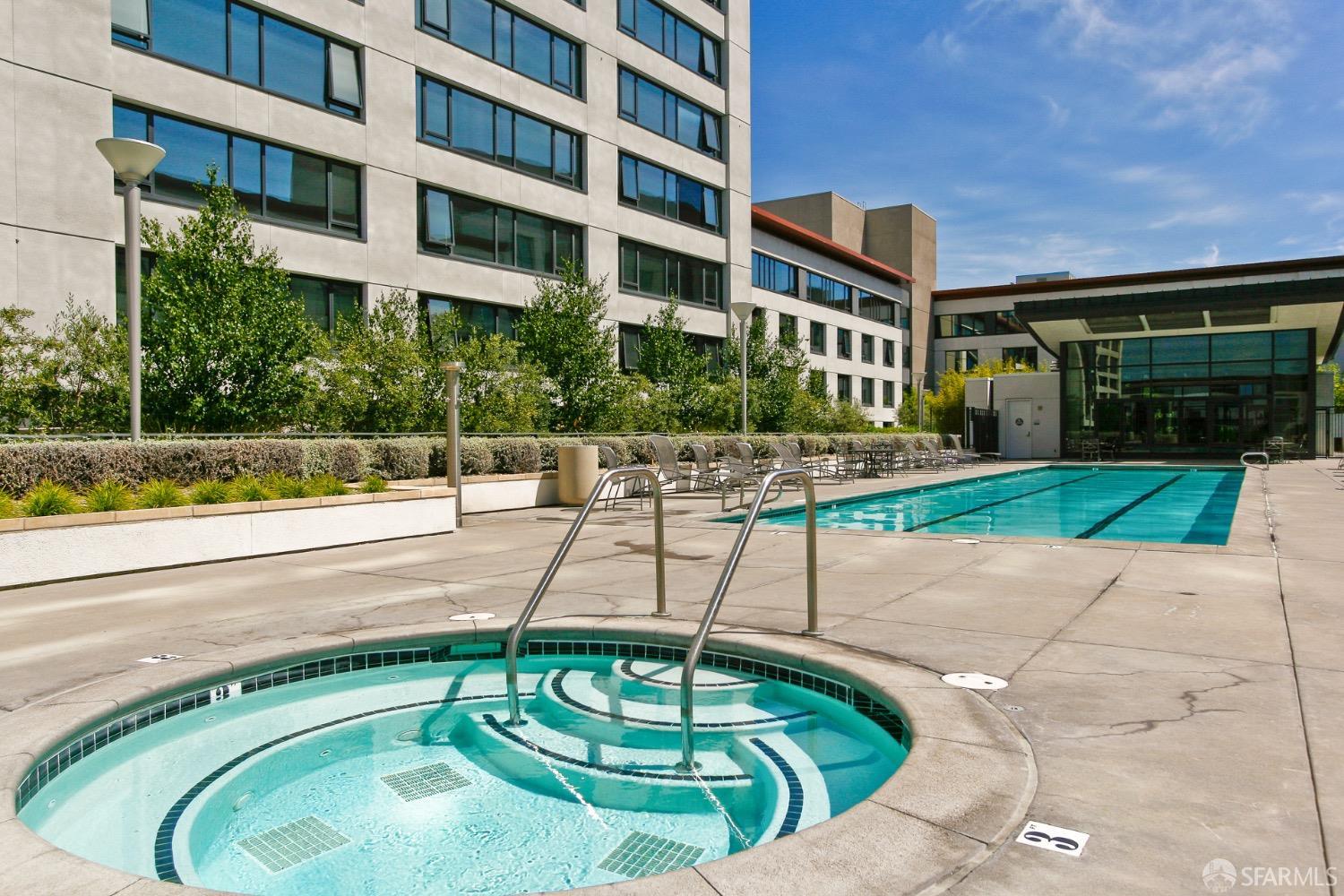 260 King Street, Unit 1107 San Francisco, CA 94107 - Photo 28 of 58 a swimming pool with outdoor seating and yard