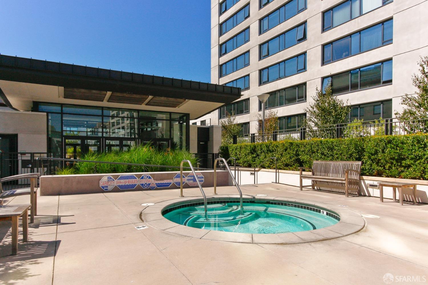 260 King Street, Unit 1107 San Francisco, CA 94107 - Photo 31 of 58 a view of a swimming pool with a patio