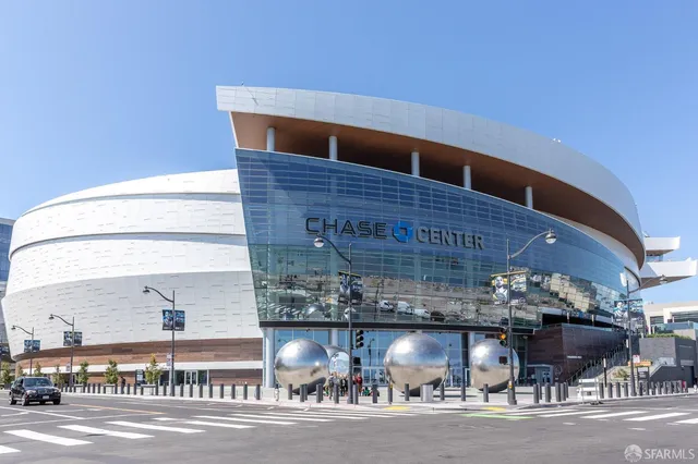 a picture of a fireplace with a wooden door