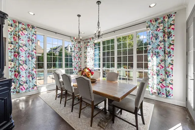 a view of a dining room with furniture window and outdoor space