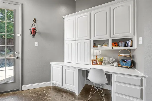 a workspace with cabinets