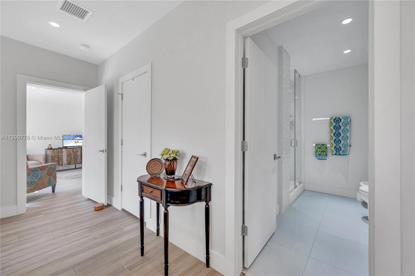 801 Southwest 28th Road Miami, FL 33129 - Photo 17 of 40 a view of room with wooden floor