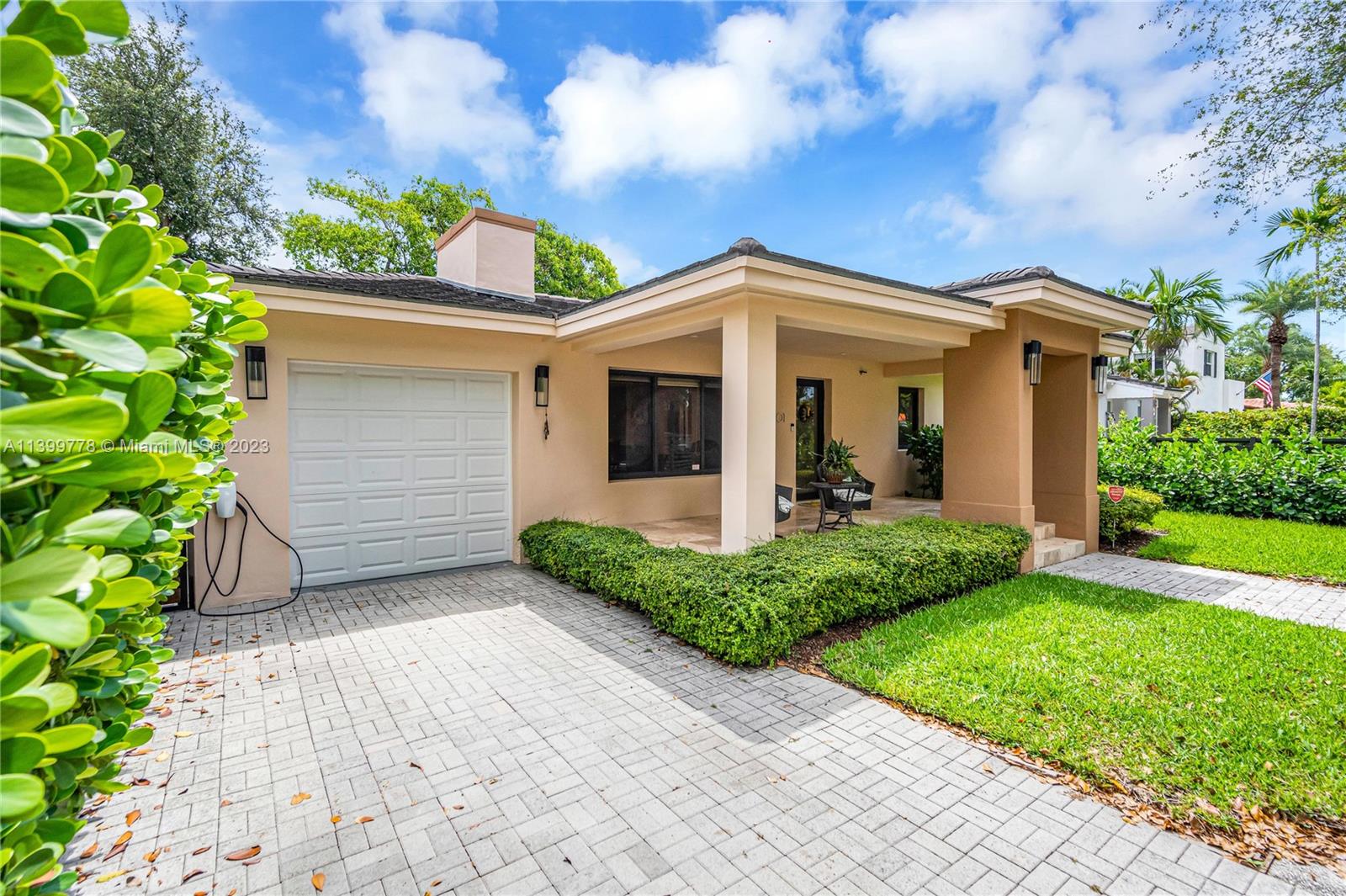 801 Southwest 28th Road Miami, FL 33129 - Photo 3 of 40 a front view of a house with a yard