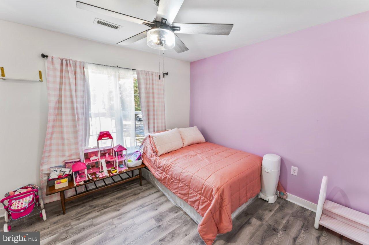 166 Bootons Lane Orange, VA 22960 - Photo 14 of 24 a bedroom with a bed closet and window