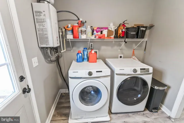a utility room with dryer and washer