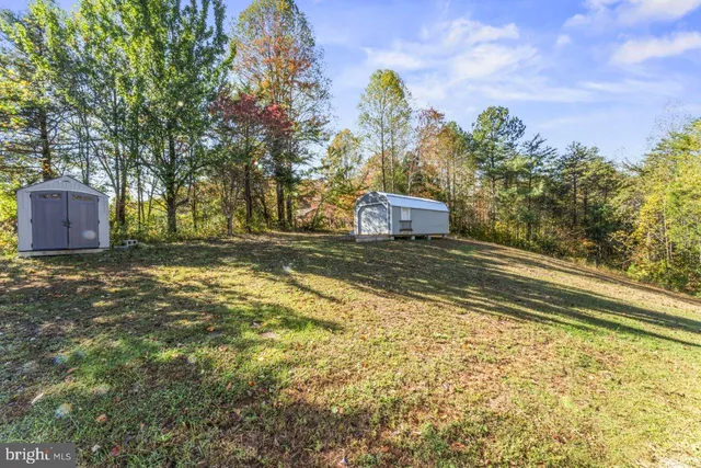 a view of a backyard of a house