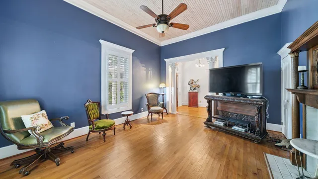 a kitchen with stainless steel appliances kitchen island granite countertop a stove a sink and a refrigerator