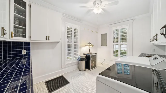 a bedroom with a bed and a mirror