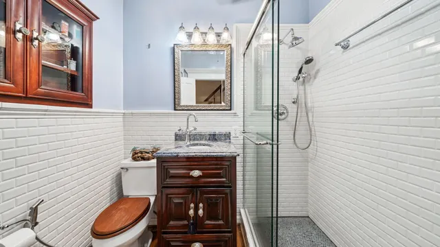 a bed room with furniture and a chandelier