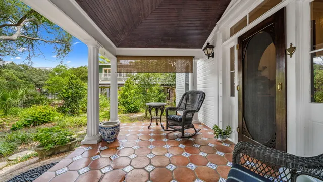 a view of hallway with wooden floor