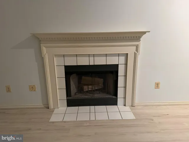 a living room with a fireplace