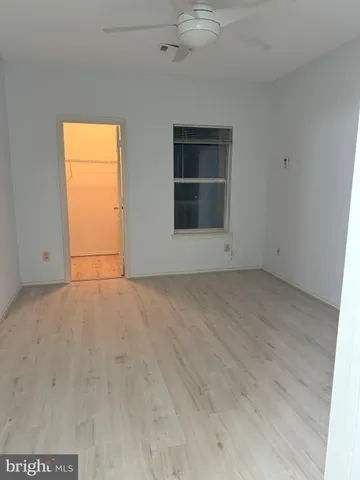 an empty room with a empty space and window