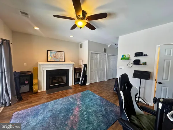 a view of livingroom with furniture and fireplace