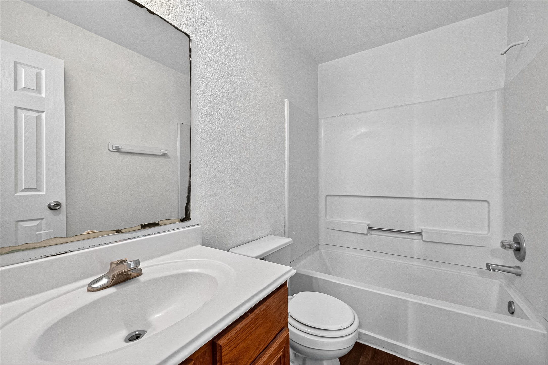 22819 Cabanna Road Spring, TX 77389 - Photo 18 of 26 a bathroom with a sink toilet and shower