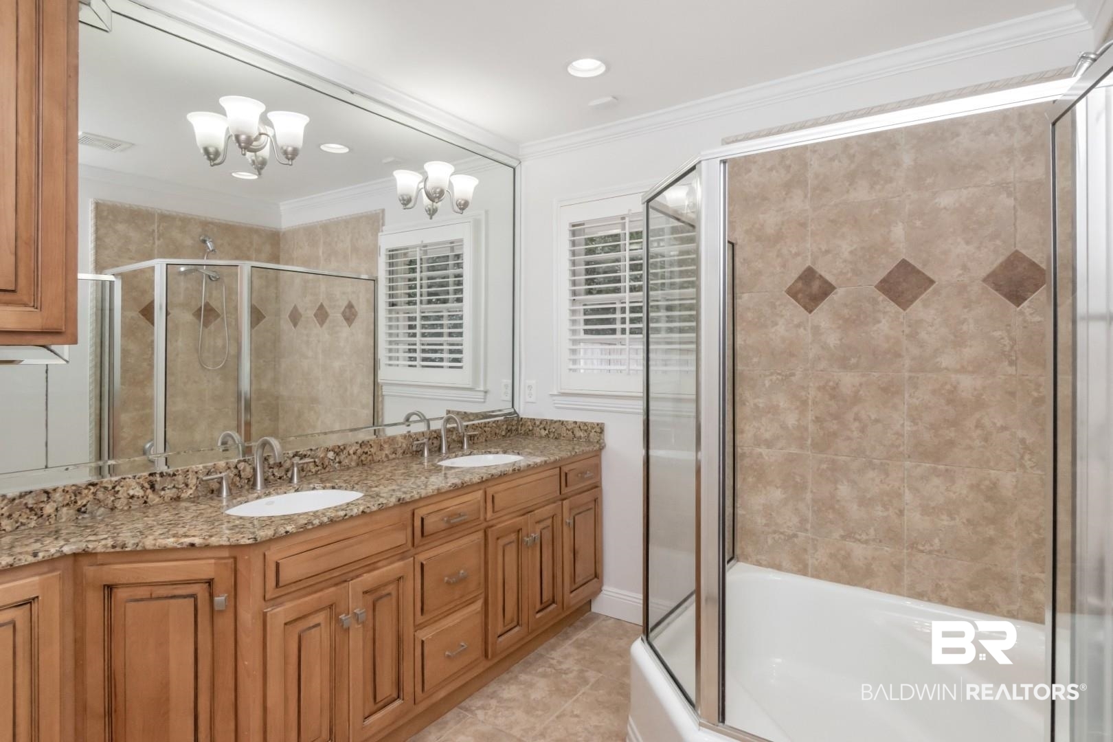 231 Rochester Road Mobile, AL 36608 - Photo 35 of 51 Bathroom with ornamental molding, double vanity, light tile patterned flooring, and recessed lighting