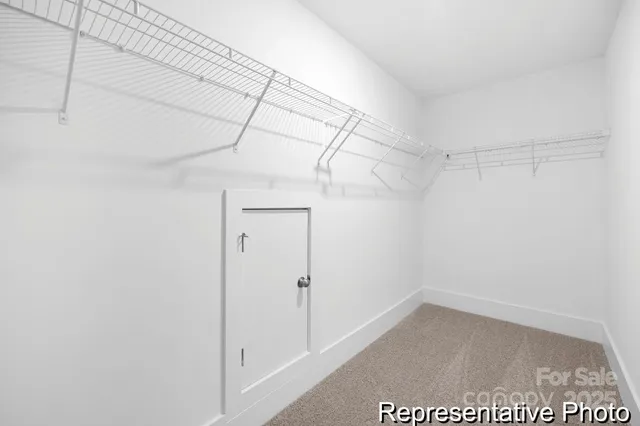 a view of a room with racks on the wall