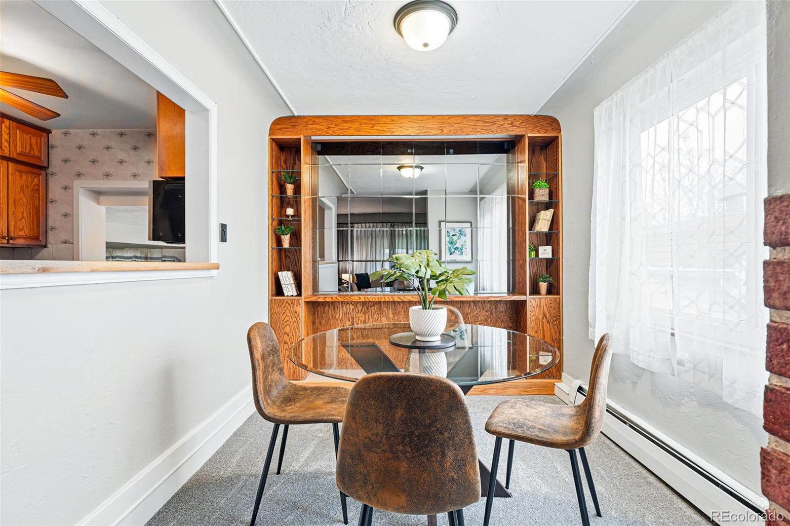 500 South Decatur Street Denver, CO 80219 - Photo 11 of 46 a dining room with furniture and window