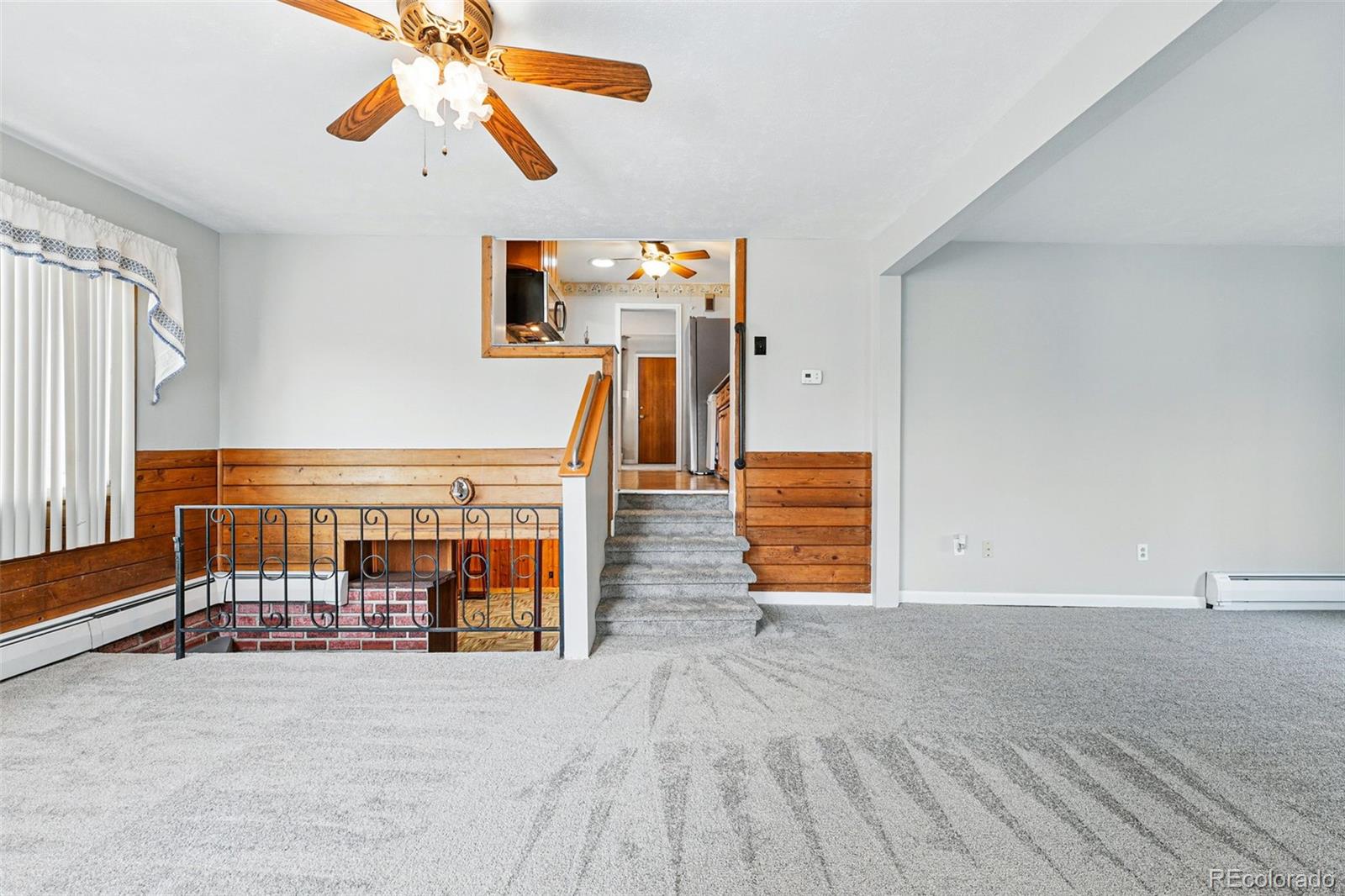500 South Decatur Street Denver, CO 80219 - Photo 18 of 46 a view of livingroom with furniture and chandelier fan