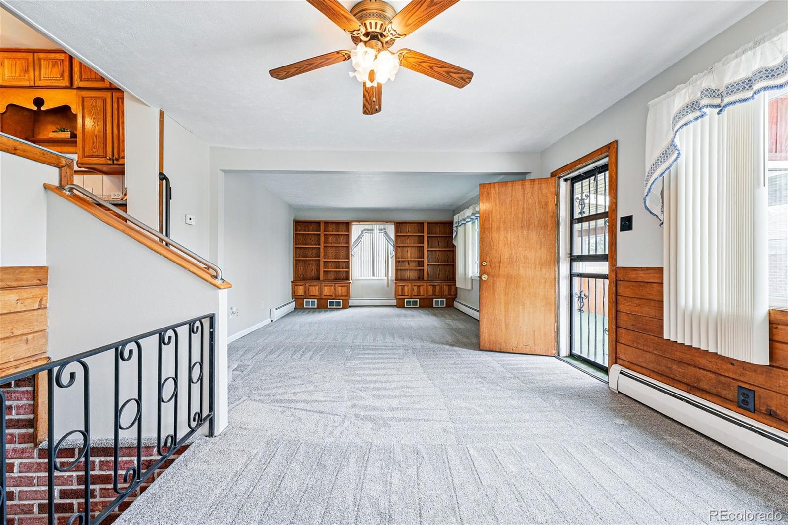 500 South Decatur Street Denver, CO 80219 - Photo 20 of 46 a view of entryway and hall with wooden floor