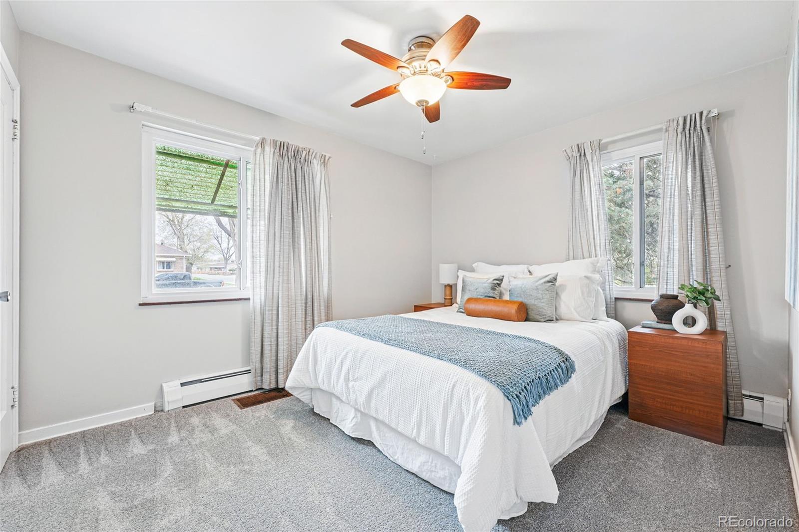 500 South Decatur Street Denver, CO 80219 - Photo 25 of 46 a bedroom with bed and window