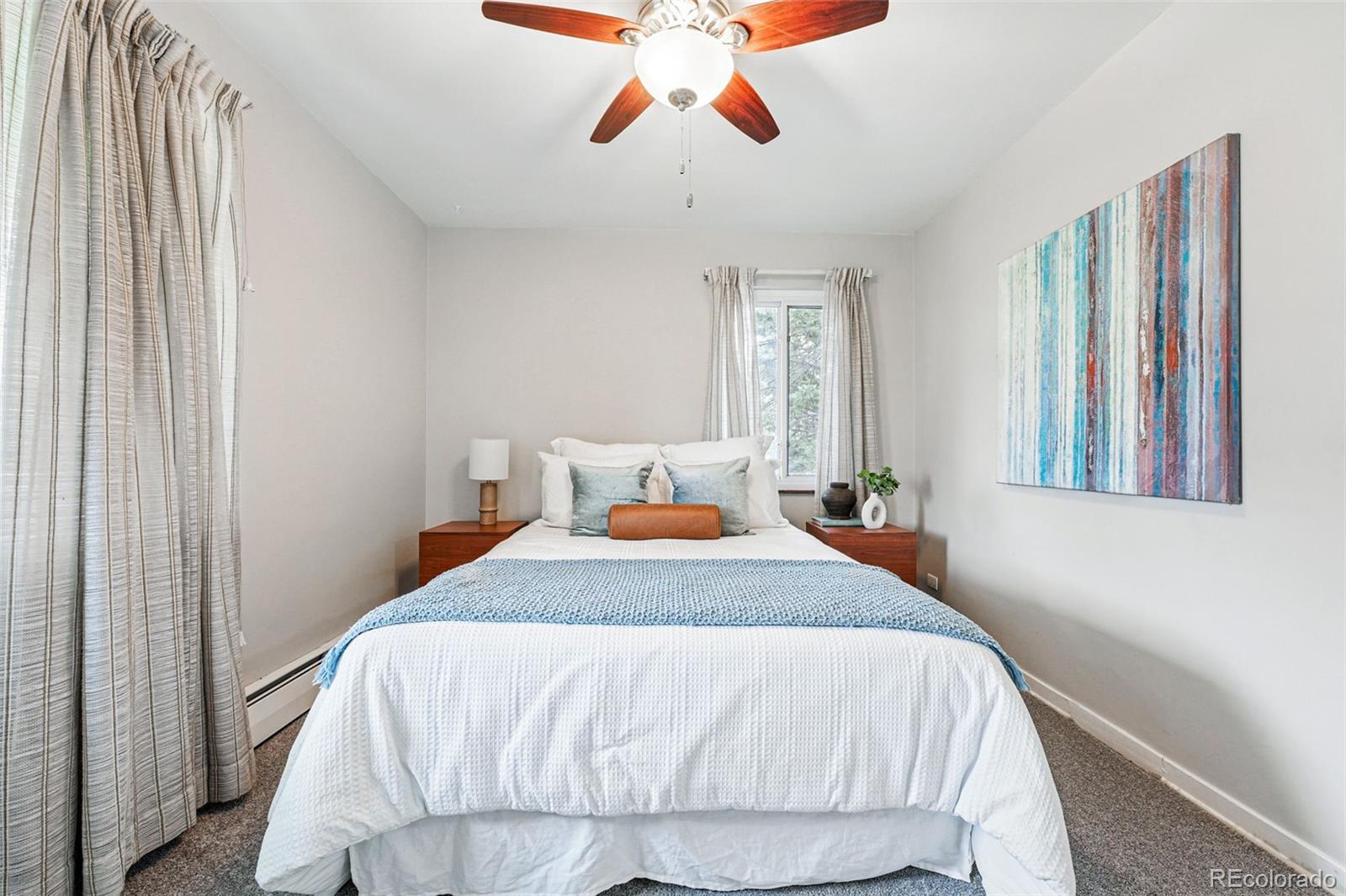 500 South Decatur Street Denver, CO 80219 - Photo 26 of 46 a bedroom with a bed and window