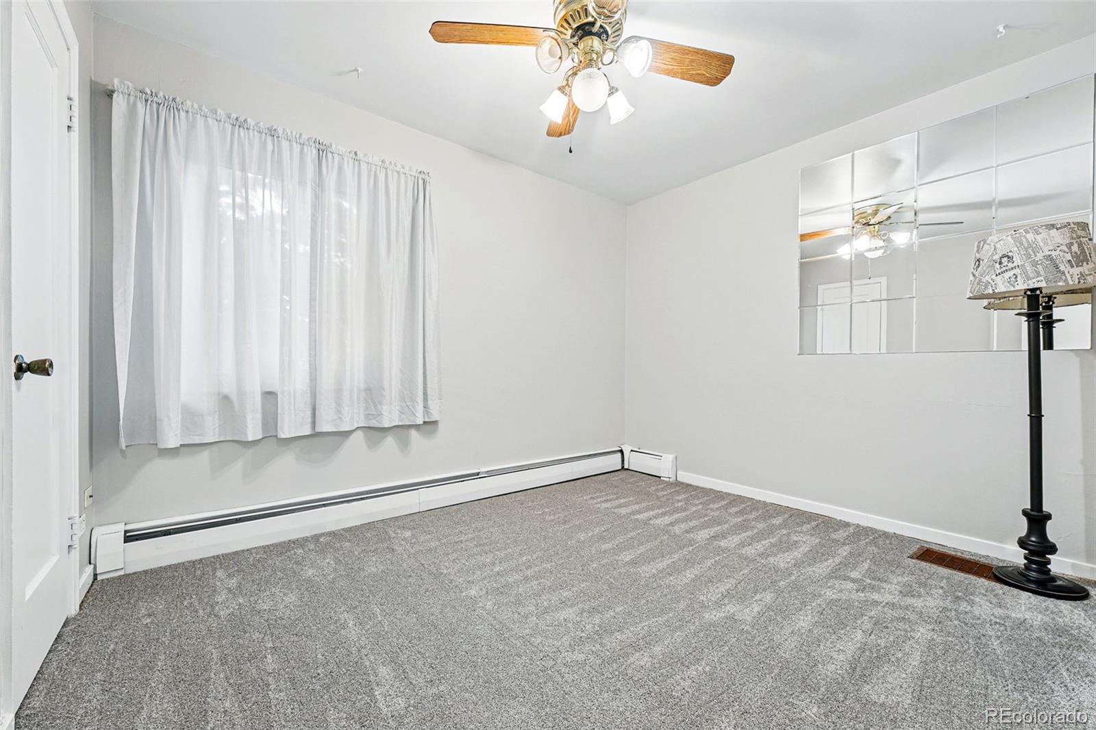 500 South Decatur Street Denver, CO 80219 - Photo 29 of 46 a view of an empty room with a window