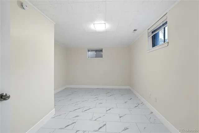 an empty room with a natural light