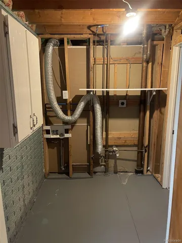 a bathroom with a mirror and a shower