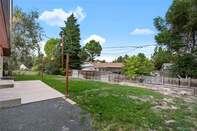 a view of a backyard with a garden