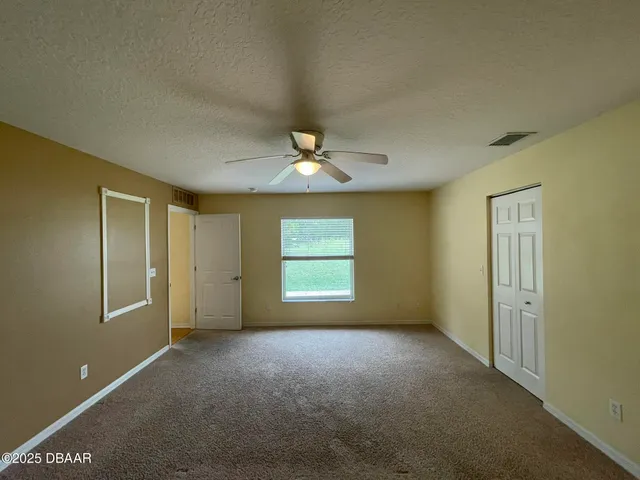 a view of a livingroom with a window