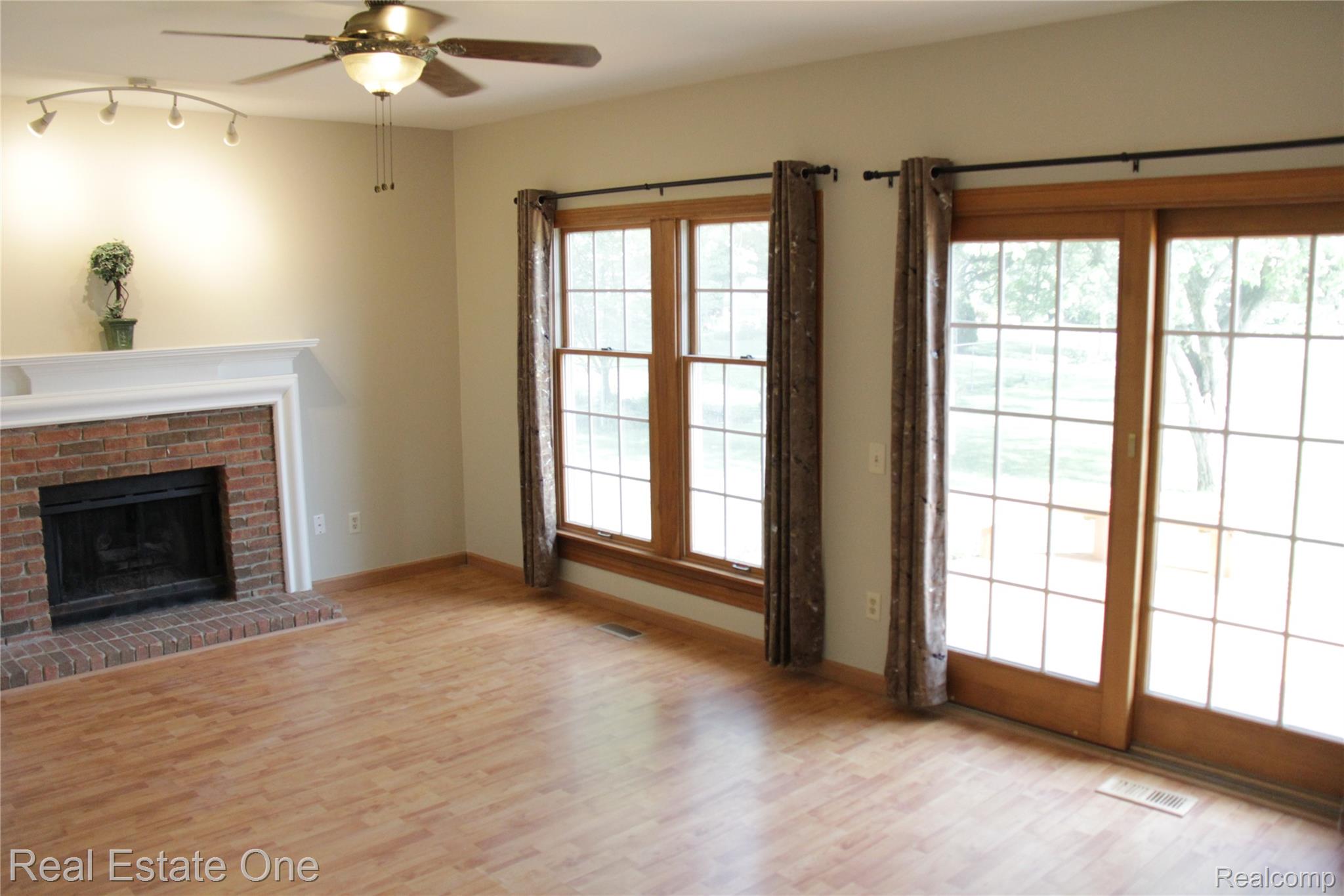44777 Saltz Road Canton, MI 48187 - Photo 30 of 65 Spacious Family room with wood-finish flooring and neutral wall tones