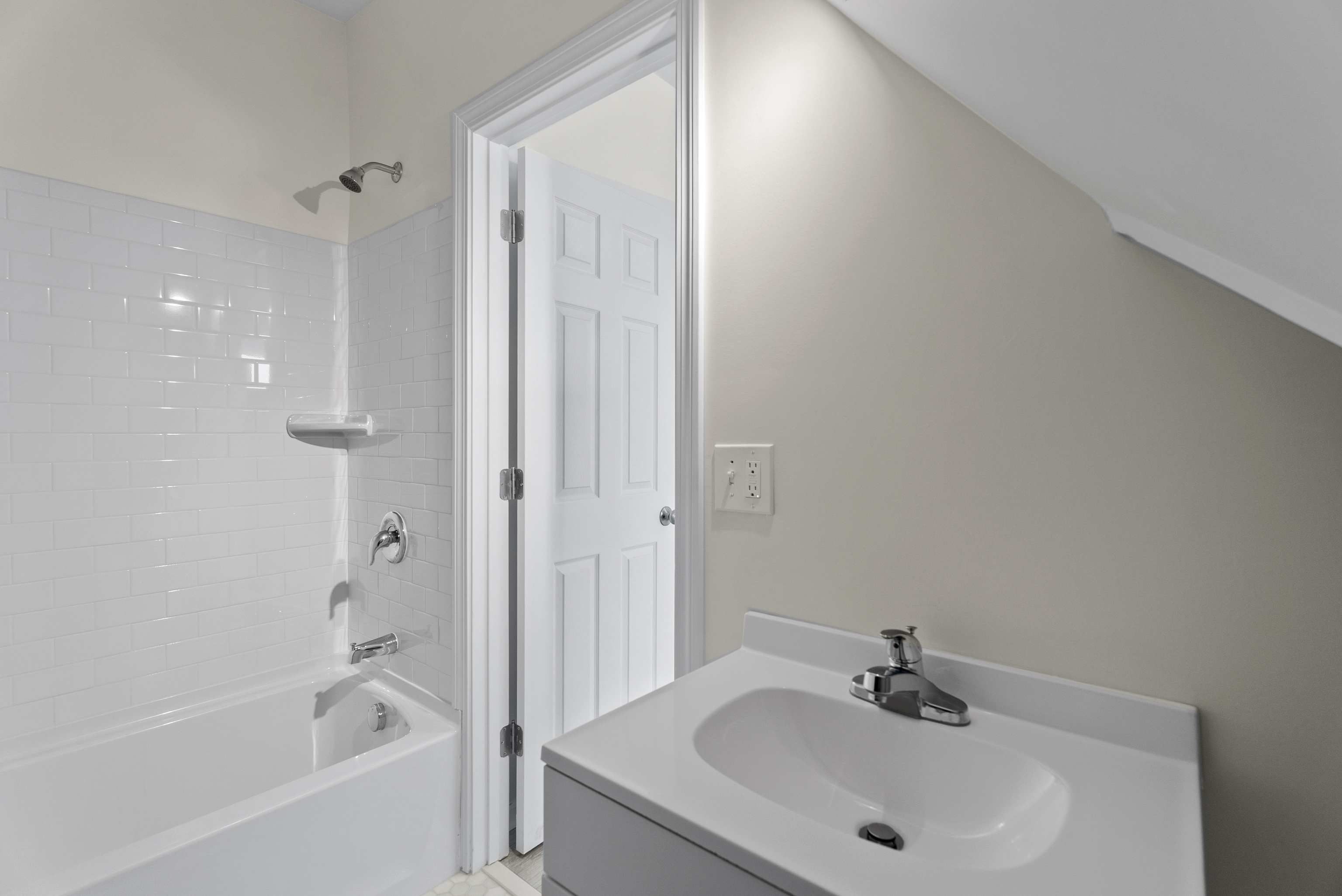 72 South Main Street, Unit 3B Wallingford, CT 06492 - Photo 5 of 8 a bathroom with a bathtub shower sink and toilet