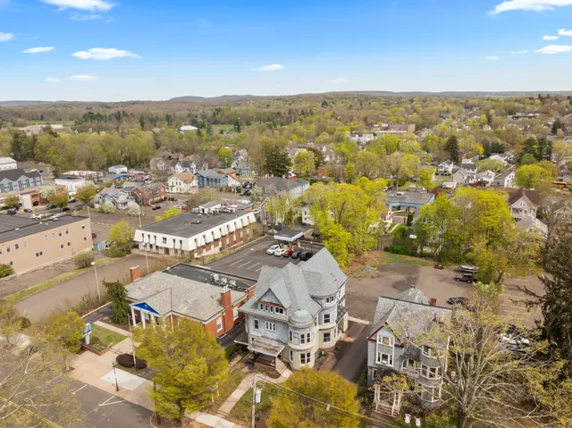 an aerial view of residential building with parking space