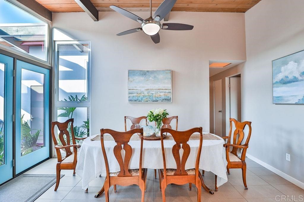 3573 Chasewood Drive San Diego, CA 92111 - Photo 11 of 57 a view of a dining room with furniture window and outside view