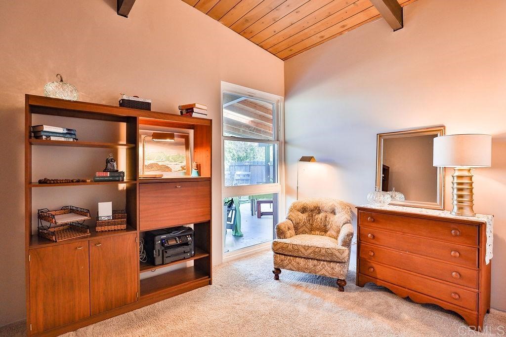 3573 Chasewood Drive San Diego, CA 92111 - Photo 25 of 57 a living room with furniture and a dresser